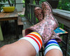 Colorful rainbow socks for expressing queer joy and authentic style