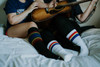 Colorful compression socks for LGBTQ+ fitness and recovery
