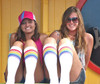 Bold rainbow tube socks for queer expression in dance, fashion, or play