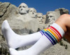 Unisex rainbow socks worn under the knee to celebrate LGBTQ+ identity
