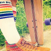 Bright and bold tube socks empowering LGBTQ+ self-expression and visibility