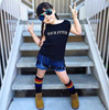 Kid jumping in the air wearing rainbow-striped socks full of love and laughter