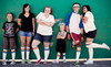 Feet of a child in rainbow socks, grounded in love and bravery