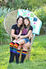mom and daughter wearing matching pride socks.