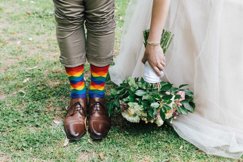 getting married in my rainbow argyle pride socks is my lucky day.  all my groomsmen are wearing the same rainbow wedding socks.