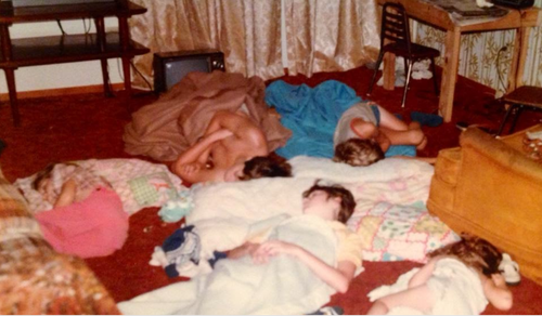 5 coda children sleeping on the floor to show love has no boundaries with pride socks