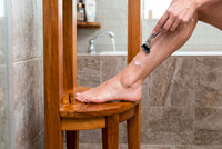 Kai-Petite Two-Tier Corner Teak Bath Stand with Angled Shaving & Washing Foot Rest