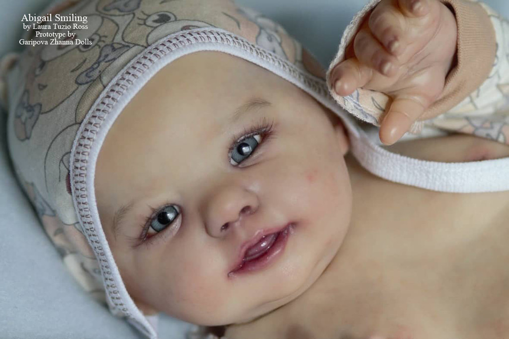 smiling reborn doll