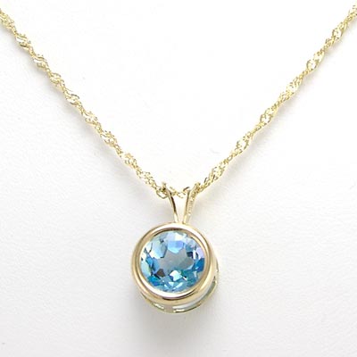 14k Gold blue Topaz Solitaire Pendant P356
