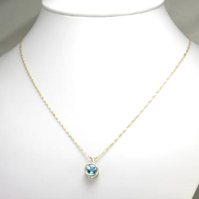 14k Gold blue Topaz Solitaire Pendant P356