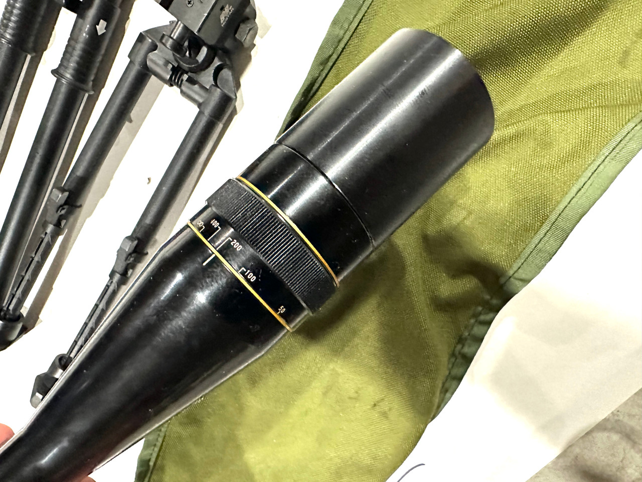 Lot 12:  Vintage Leupold 12x Scope with Rings and MSN 67 Markings, 2 x bipods