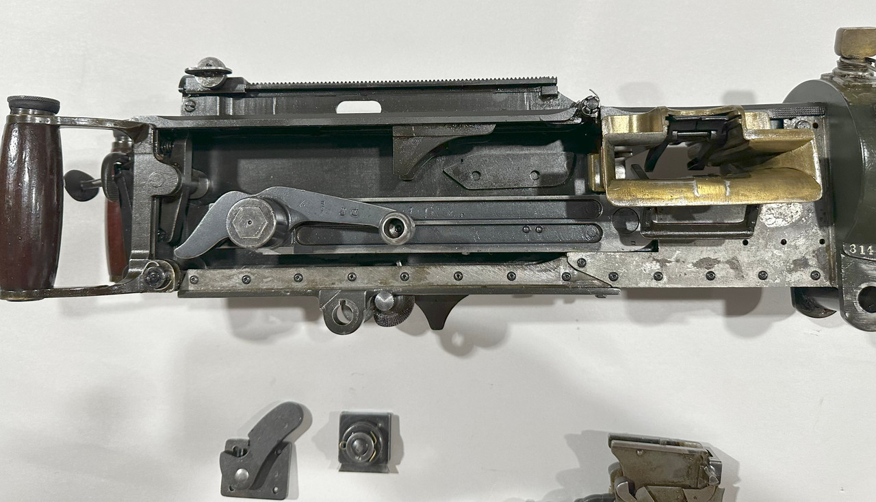 Lot RM-250731-03: Aussie Vickers MMG Parts Kit  and Display (ships free)