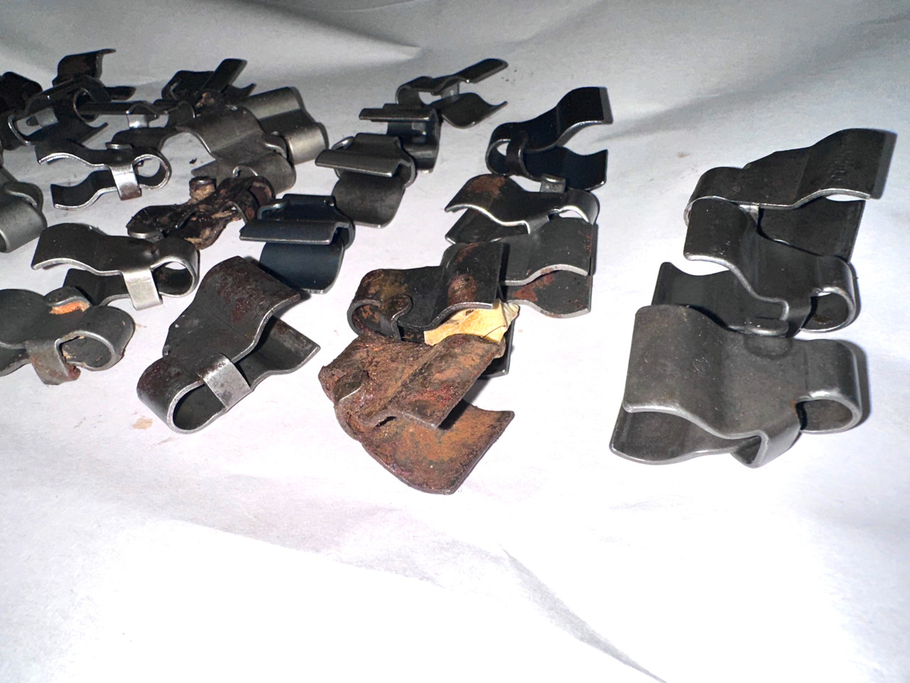 Lot 260211-03: 33 x Very Low Grade 1903 Front Sight Protectors