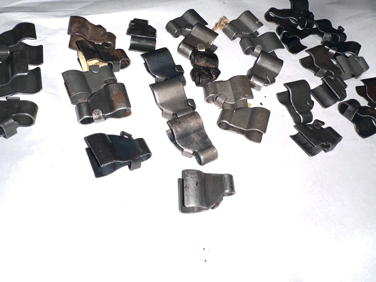 Lot 260211-03: 33 x Very Low Grade 1903 Front Sight Protectors