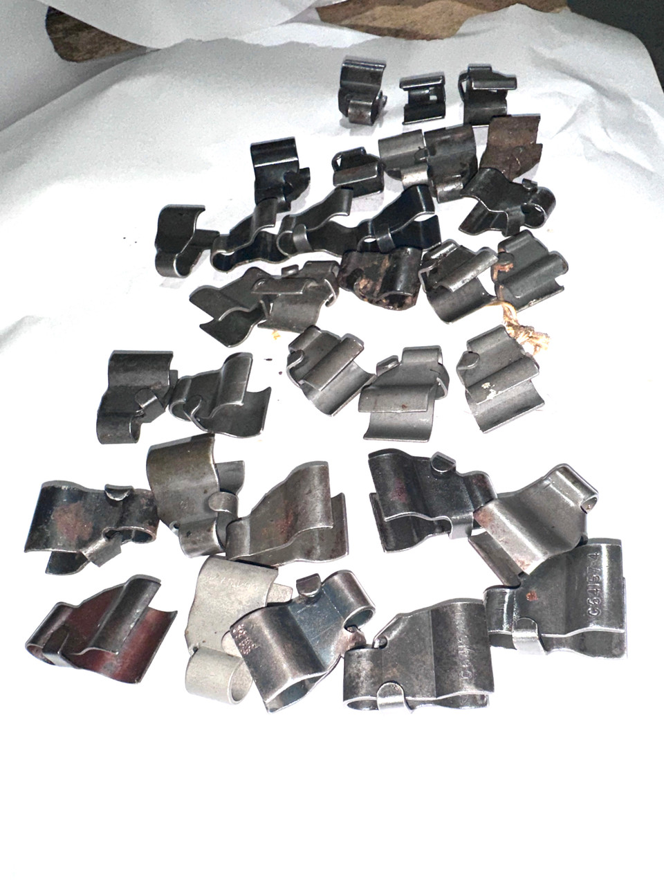 Lot 260211-03: 33 x Very Low Grade 1903 Front Sight Protectors