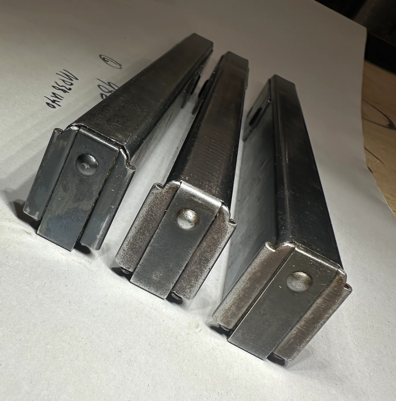 Lot 260430-06: 3 x MP40 'slab side' Magazines with Steyr markings dated 1941