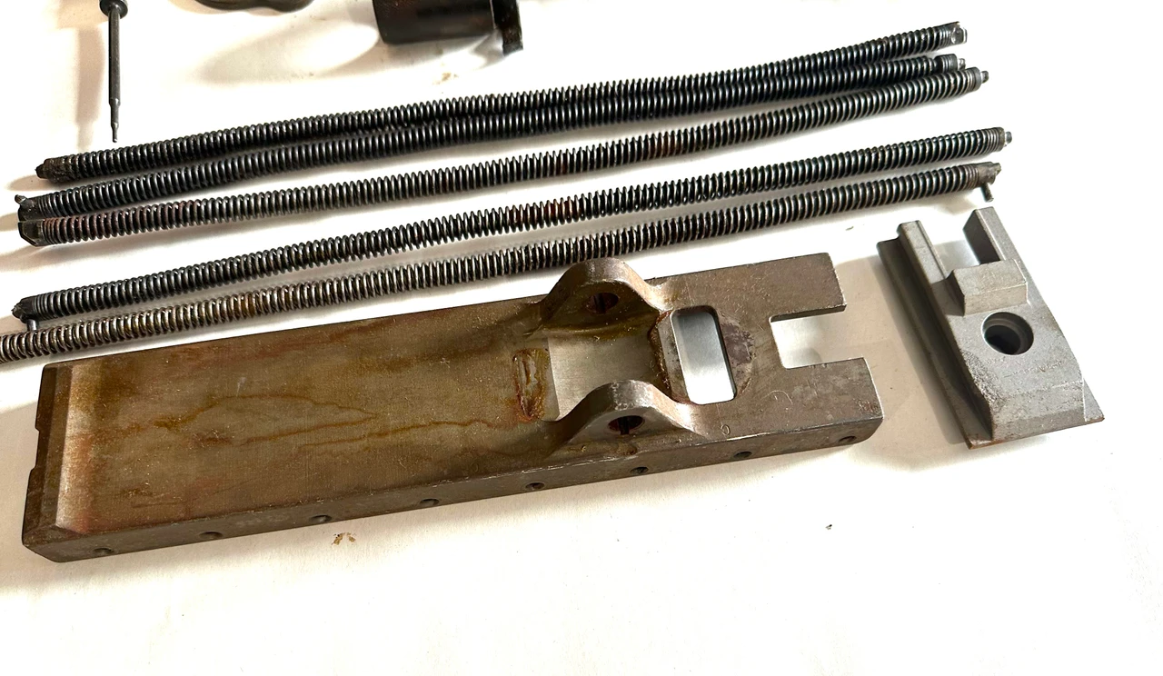 Lot 260506-03: M2HB Back Plate, Bottom Plate, Accelerator and More