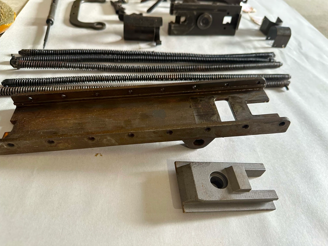 Lot 260506-03: M2HB Back Plate, Bottom Plate, Accelerator and More