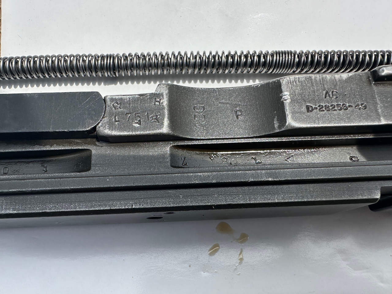 Lot 260508-04:  M2HB Bolt (Complete Less ALTERNATE FEED KNOB) with Drive Spring Rod Asm