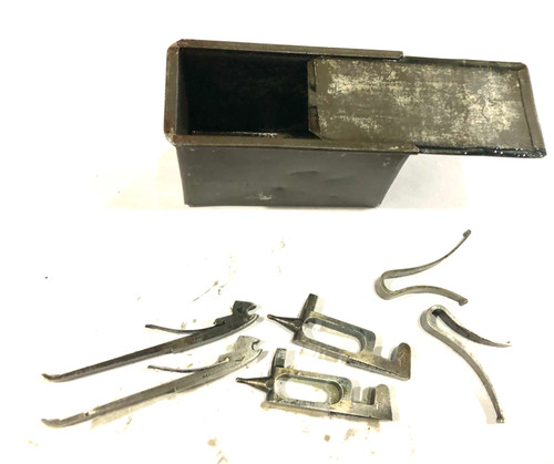 Small Parts Tin with Strikers, Springs, and Sears