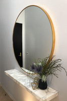 Modern Round Brass Mirror, in situ