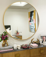 Modern Round Brass Mirror, in situ