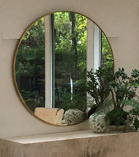 Modern Round Brass Mirror, in situ