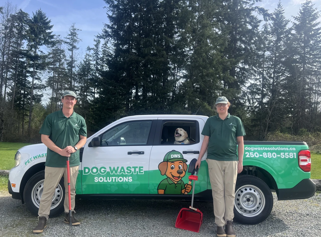 Dog Waste Solutions team with their branded service truck