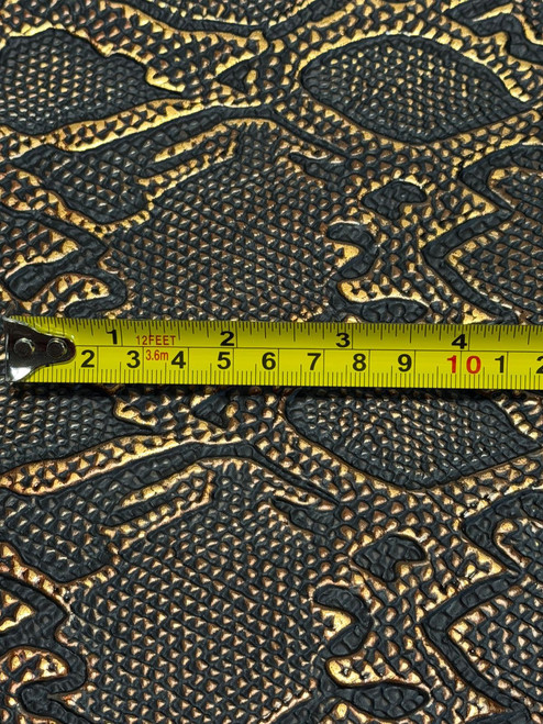 Cascabel leather sheet with scale reference, metallic embossed cowhide for bags, belts, and custom leather design