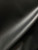 Luxury smooth black leather sheet with protected full aniline finish for upholstery, and designer leathercraft
