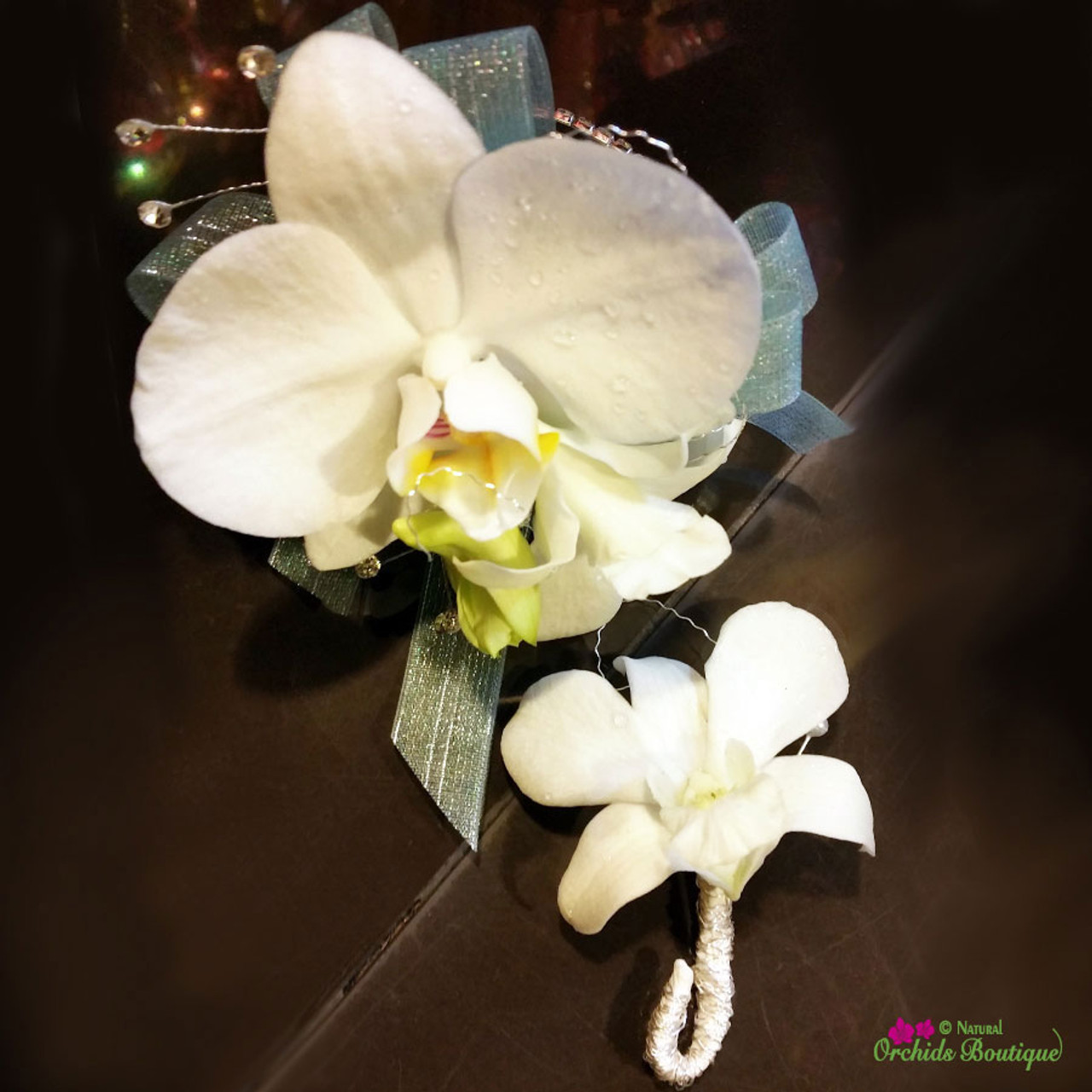 white orchid corsage boutonniere