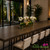 White Phalaenopsis orchid arrangement in a modern rectangular glass vase with same-day Miami delivery