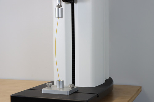 Spaghetti Flexure Fixture quantifies flexure characteristics of uncooked spaghetti and other dry pastas.