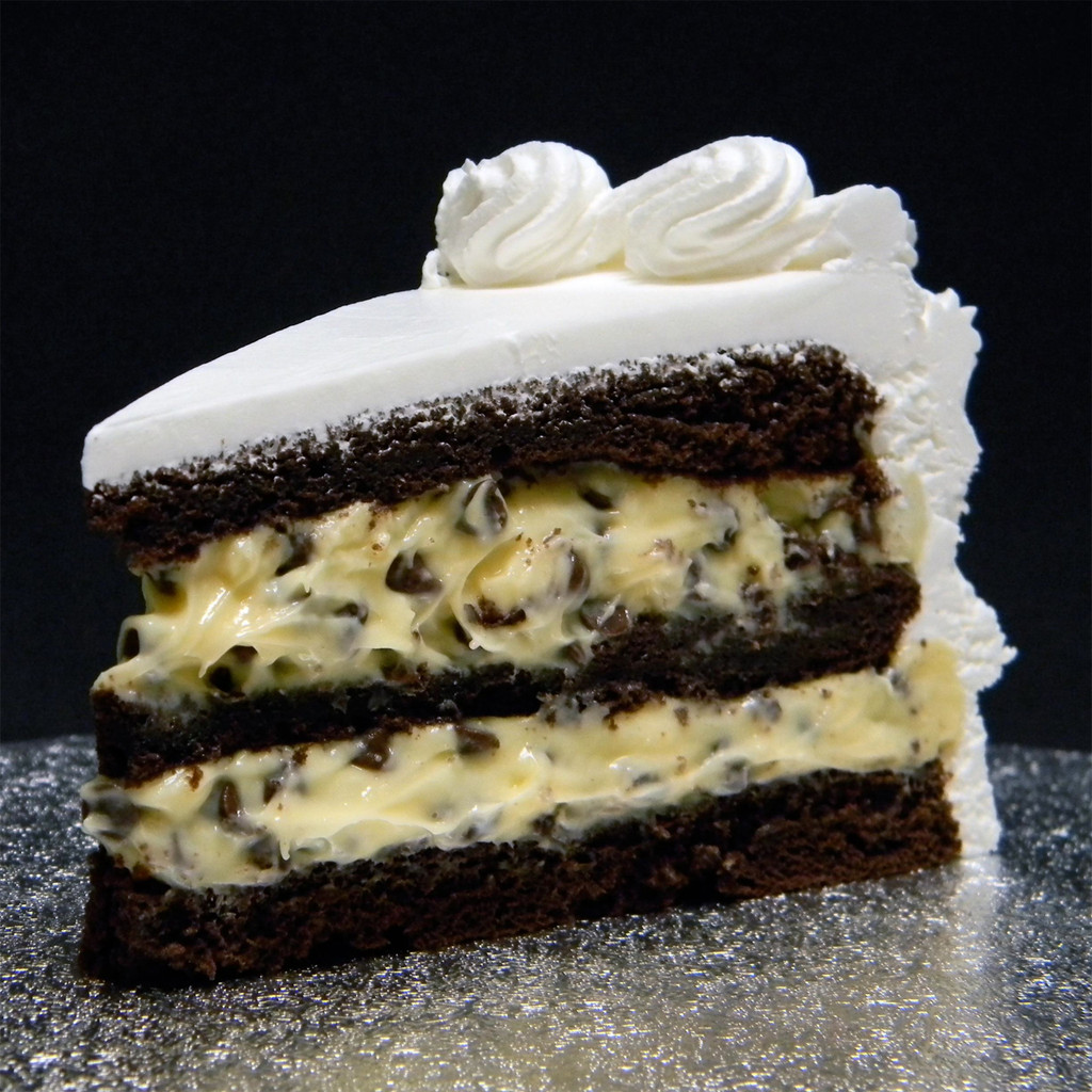 TUXEDO: moist layers of Chocolate cake filled with creamy French Vanilla custard studded with mini, gourmet, dark chocolate chips.