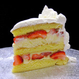 STRAWBERRY FRENCH VANILLA: moist layers of Yellow cake filled with French Vanilla custard layered with fresh sliced strawberries. Add $4. 
STRAWBERRY RUM: our top-seller! Moist layers of Yellow cake filled with non-alcoholic Rum custard layered with fresh sliced strawberries. Add $4.