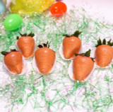 Premium strawberries dipped in orange colored white chocolate ganache with edible glitter.