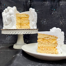 White cake layers + Coconut-Amaretto custard.