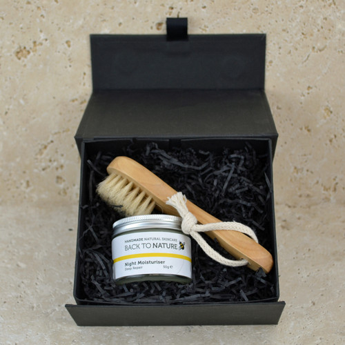 Moisturiser and face brush gift set for night time skin care