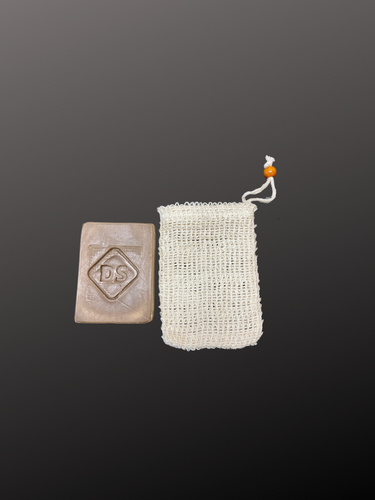 Sisal sac scrubber next to bar soap (not included)