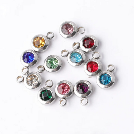 Birthstone Crystal Collection - a delightful set of 12 small, 6mm birthstone crystals meticulously crafted from 304 jewellery-grade stainless steel. Each crystal is adorned with a grade A rhinestone, ensuring unparalleled sparkle and brilliance that captures the essence of each birth month.