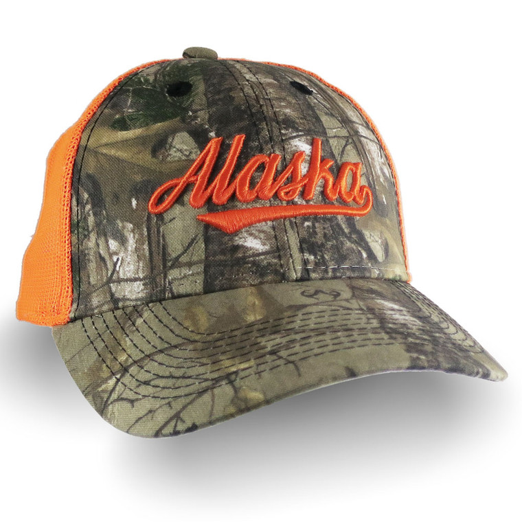 An Alaska 3D puff raised safety orange embroidery design on a stylish adjustable structured Realtree camo trucker cap.