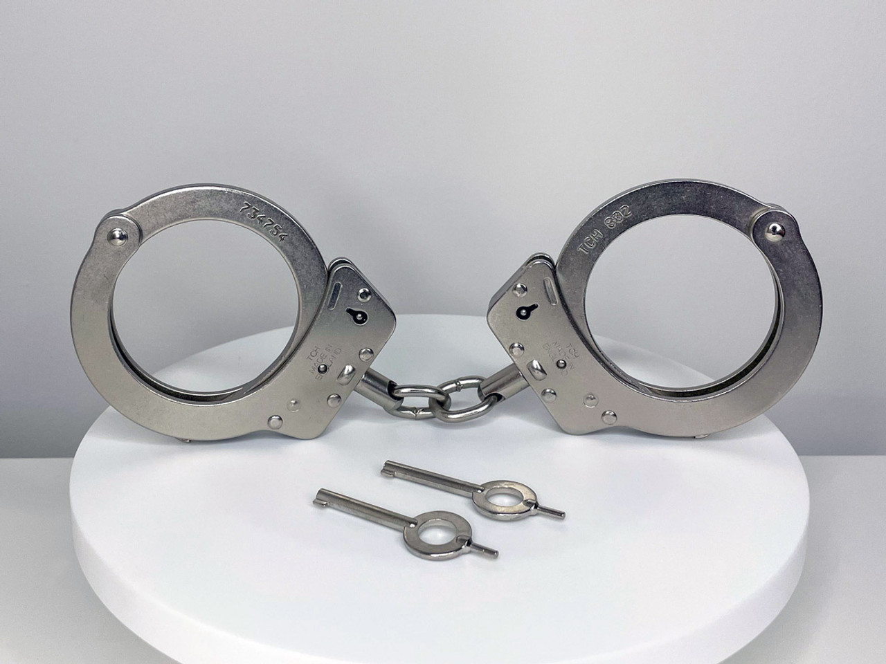 TCH Model 802 Dual Key Hole Standard Nickel Handcuffs