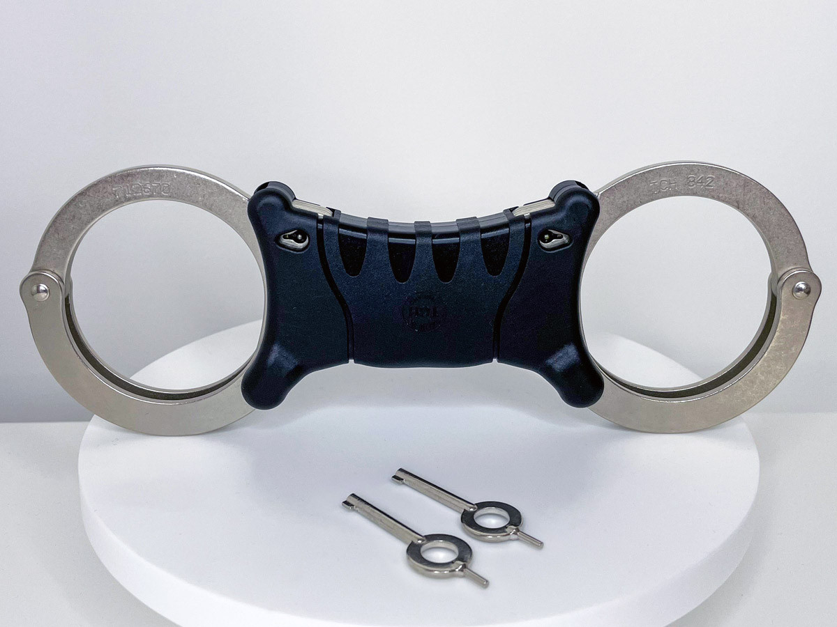 TCH Model 842 Dual Key Hole Rigid Nickel Handcuffs