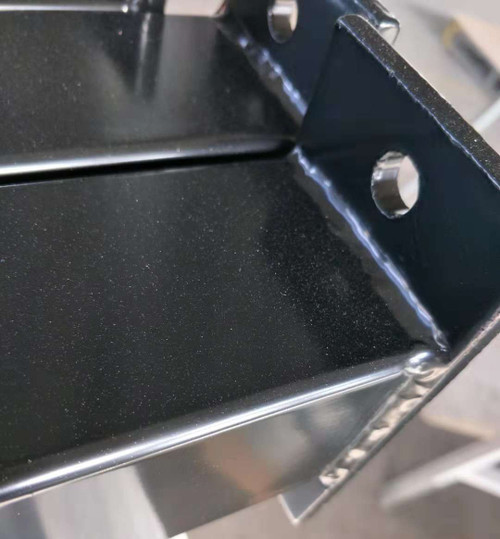 Fully welded base plate on 2.7m long Security Fence Post. 130mm long x 70mm wide. Holes are 12.8mm.