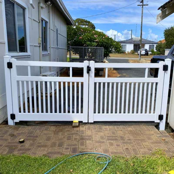 PVC Picket Fencing - DIY Double Gate Installation photo. White Flat-top double-top rail design.