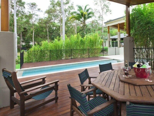 Photo of Black aluminium pool fencing - works well in front of greenery and gardens!