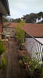 900mm high black Aluminium garden fence panels on a low deck (under 1m drop).
