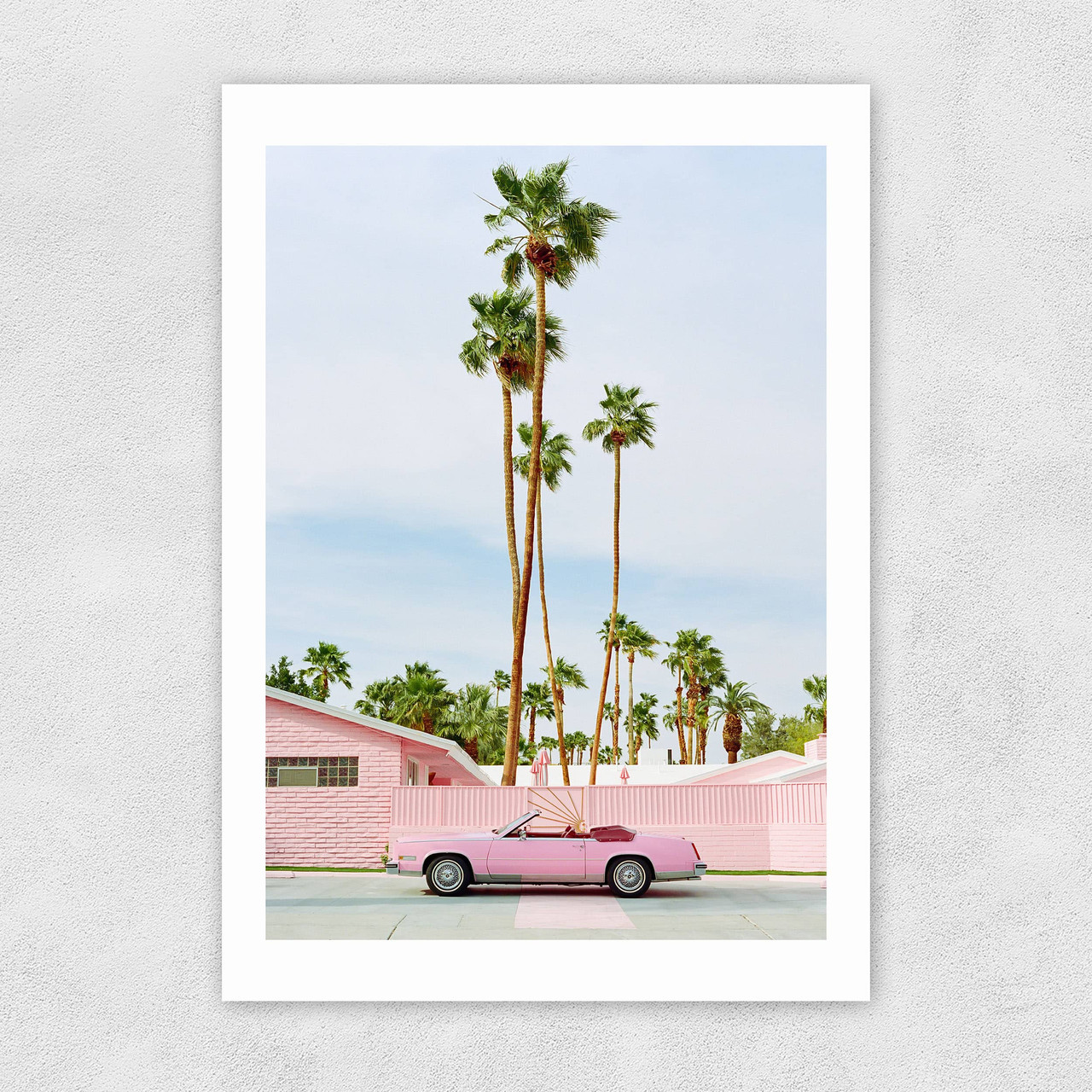 Pink Palm Springs art print by Bethany Young in black frame 