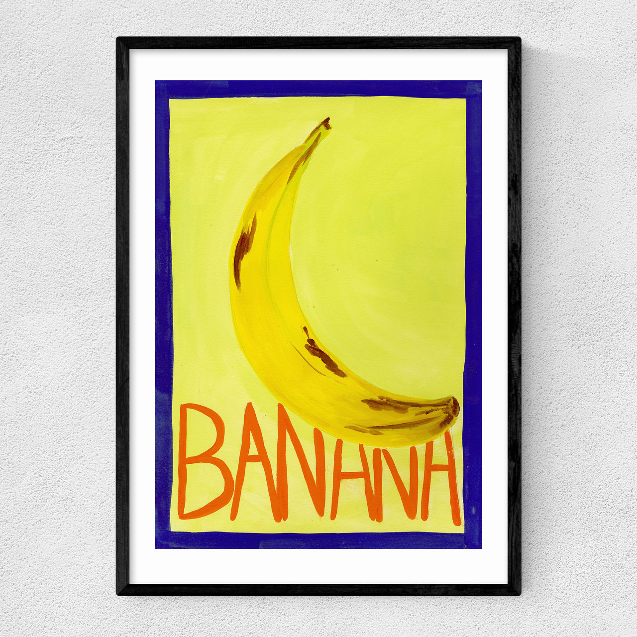 yellow banana art print by susie miller in black frame