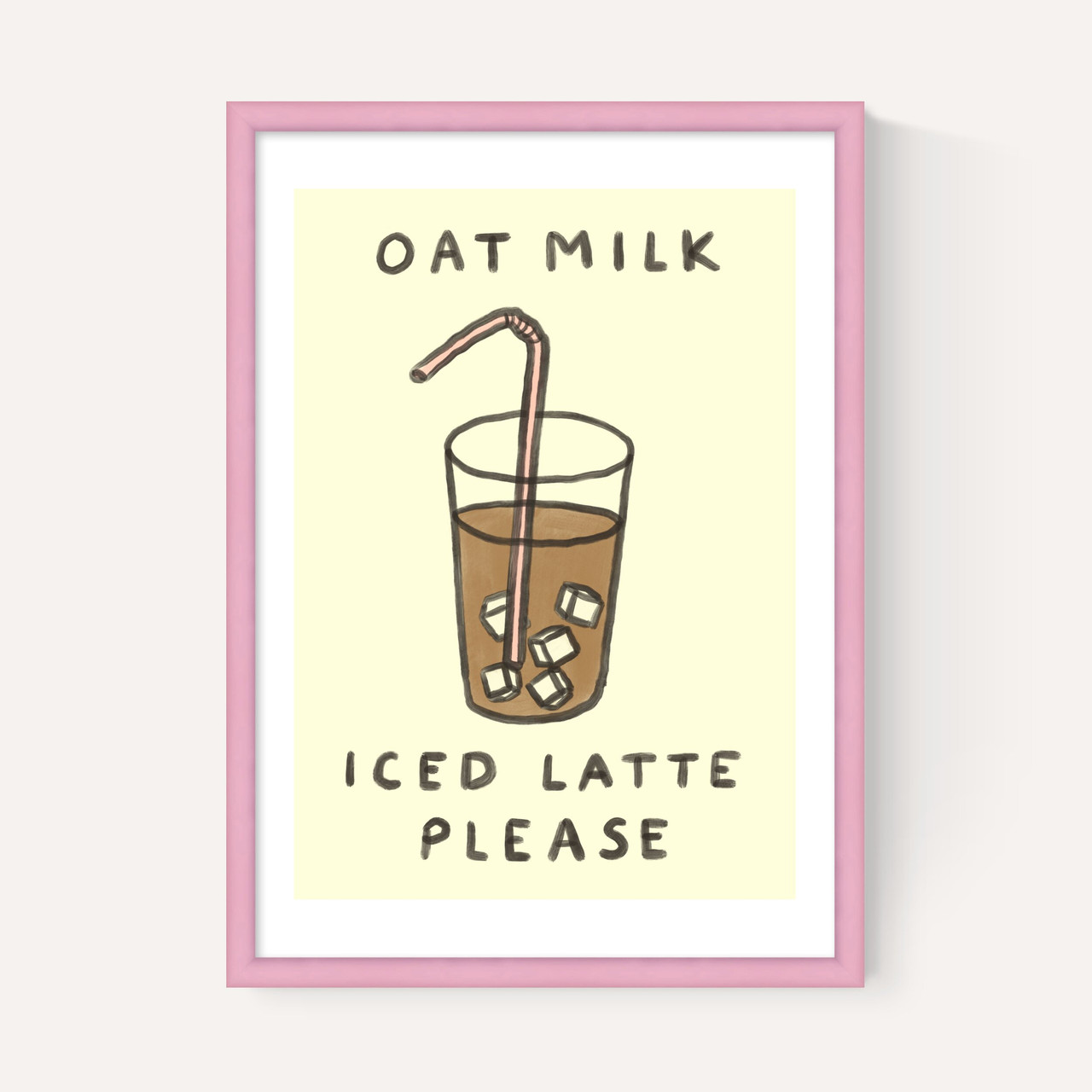 Oat milk iced latte art print by she snacks and paints in pink frame